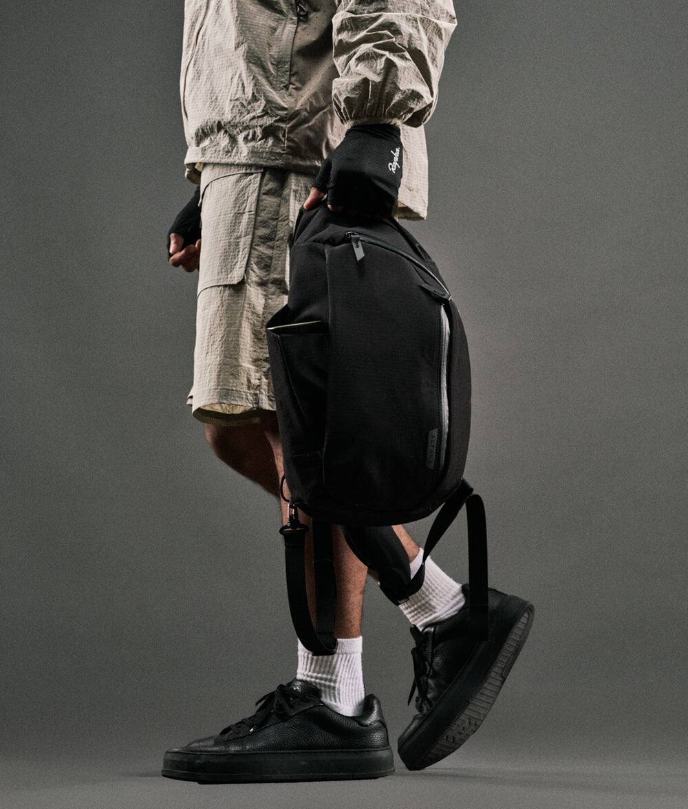 Back. ALPAKA - Metro Crossbody Left Shoulder Sling Bag Men,Sling Backpack - Fits 11" Tablet - Single Shoulder - Black Axoflux 210D.