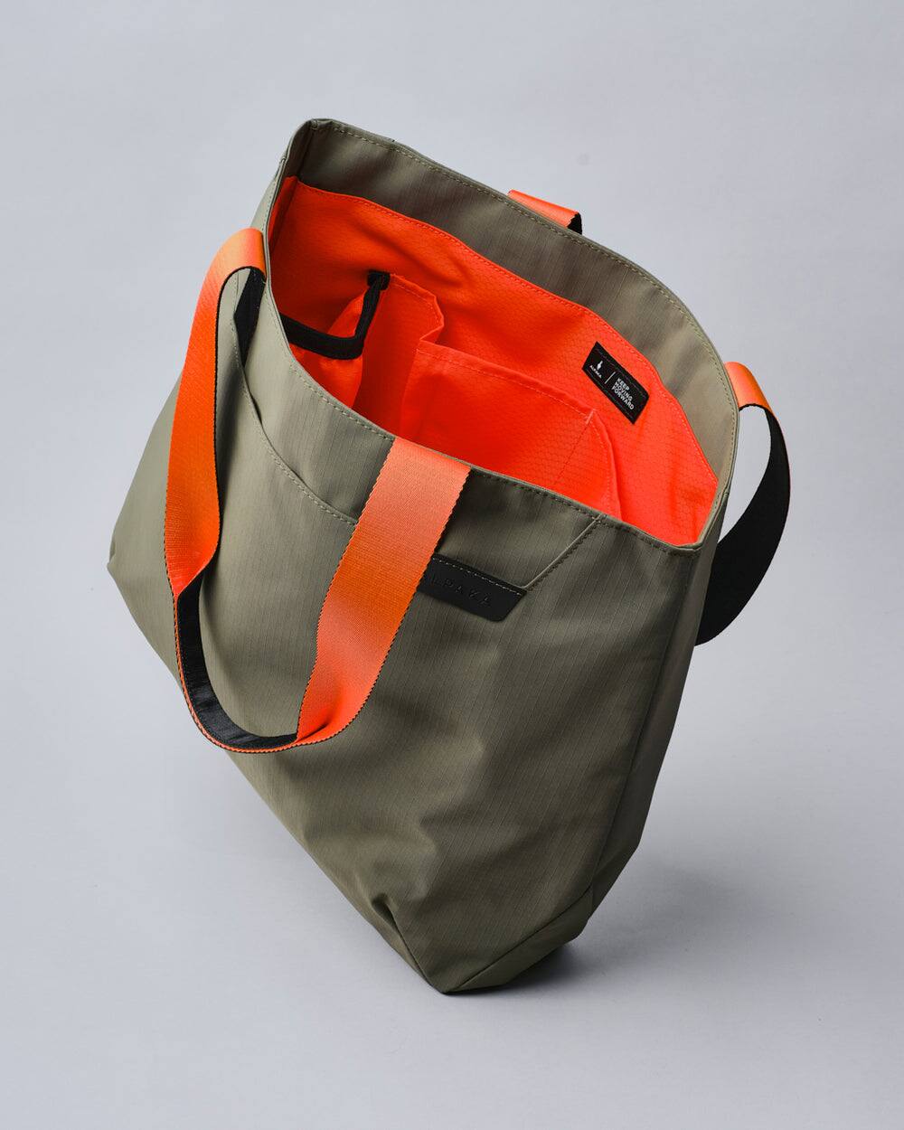 Alt View 2. ALPAKA - Elements Tote Bag 14.5L Weatherproof Foldable Travel Tote with Magnetic Closure - Green Axoflux 210D.