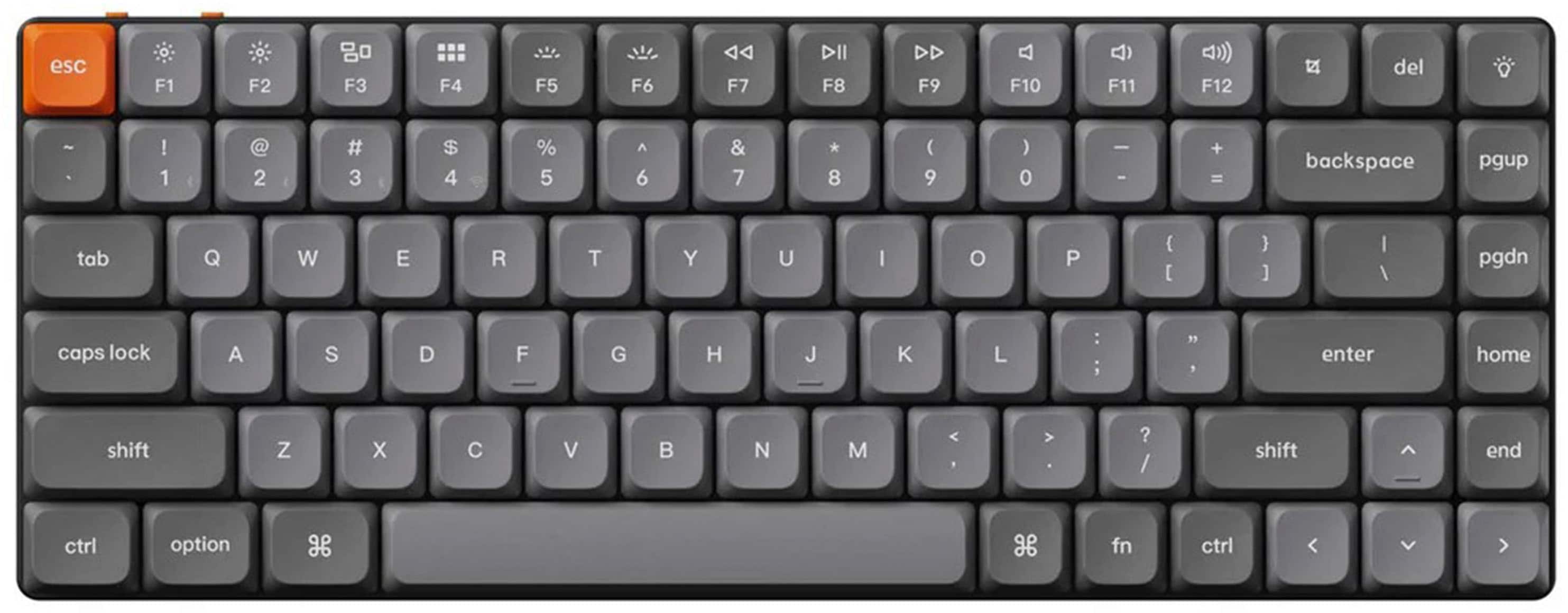 The image shows a close-up of a computer keyboard with a white background. The keyboard has a gray and black color scheme, and it features a variety of keys, including letters, numbers, and function keys. The keys are arranged in rows, with some keys located at the top, middle, and bottom of the keyboard. The keyboard also includes a space bar, which is a key used for typing spaces in text. Additionally, there is a key labeled "fn" on the keyboard, which is a function key that can be used in combination with other keys to perform specific actions.