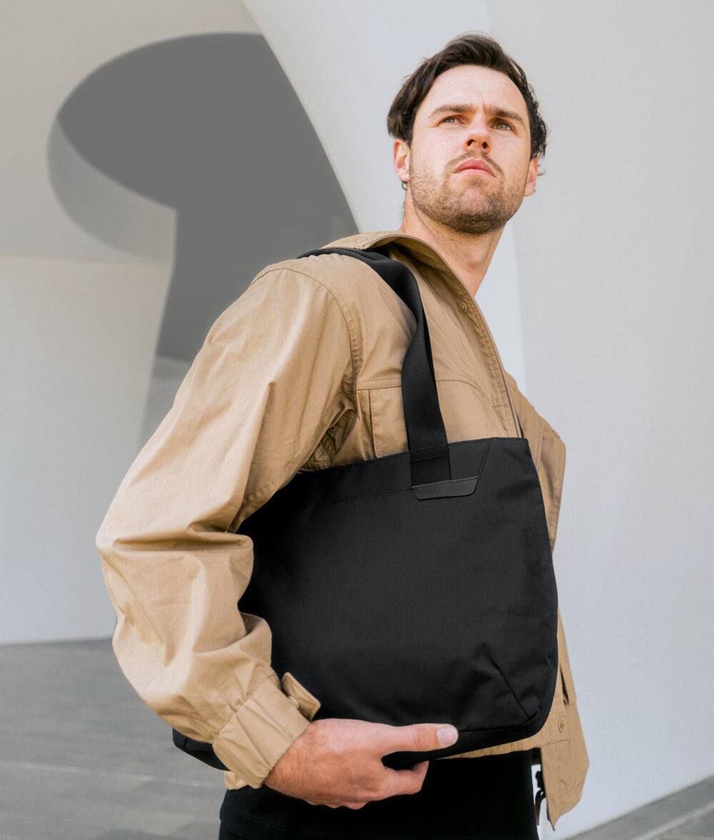 Alt View 9. ALPAKA - Small Tote Bag for Work & Travel, 9L,Fits 11" iPad/Tablet, Magnetic Open-Top, Bottle Sleeves, Slip Pockets - Black Axoflux 210D.
