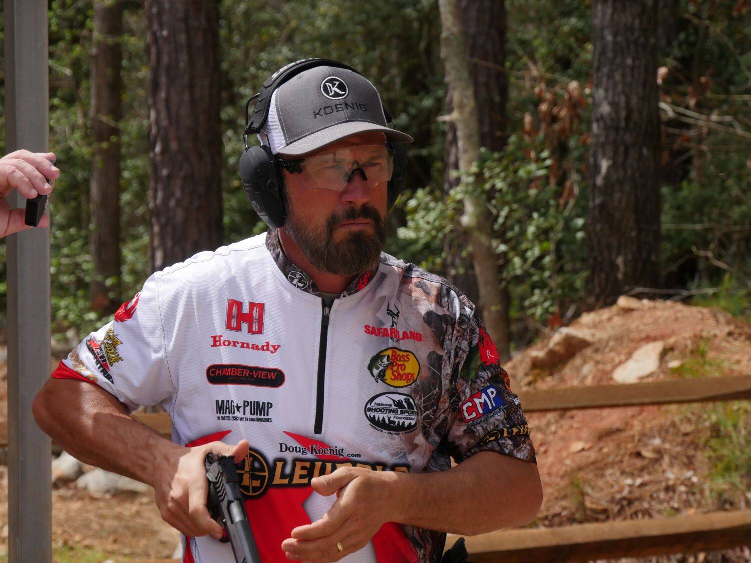 Sure, here is the corrected and grouped text from the image:

- Koenig
- Hornady
- SAFARILAND
- Bass Pro Shops
- CHAMBER-VIEW
- MAG+ PUMP
- National Shooting Sports Foundation
- CMP
- Doug Koenig.com
- LEU