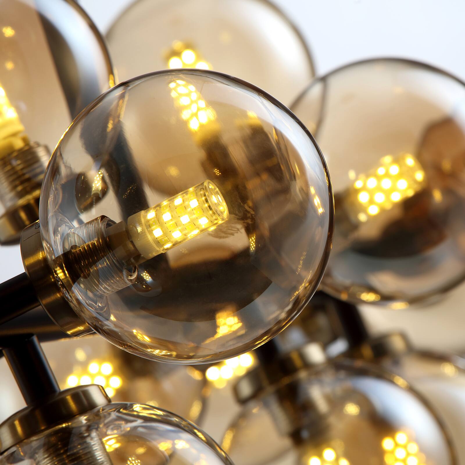 Alt View 3. Siljoy - 39.4In Black Gold 16-Light Linear Sputnik Chandelier Adjustable Amber Glass Pendant for Dining Kitchen Living Room - amber.