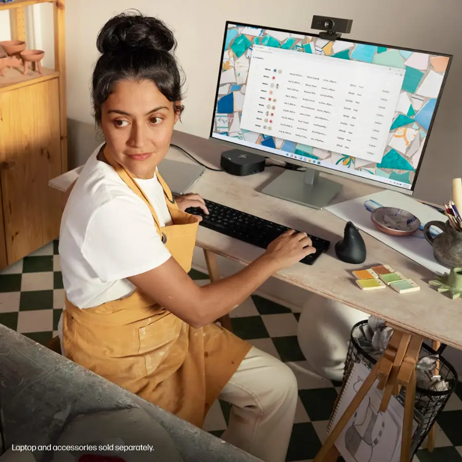 Laptop and accessories sold separately.
