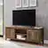Alt View 13. Walker Edison - 70" Modern Farmhouse Simple Grooved Door TV Stand for most TVs up to 80" - Rustic Oak.
