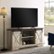 Alt View Zoom 1. Walker Edison - 58" Modern Farmhouse Sliding Door TV Stand for Most TVs up to 65" - Rustic White Brown.