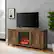 Alt View 13. Walker Edison - 58" Modern Farmhouse Barndoor Fireplace TV Stand for Most TVs up to 65" - Rustic Oak.