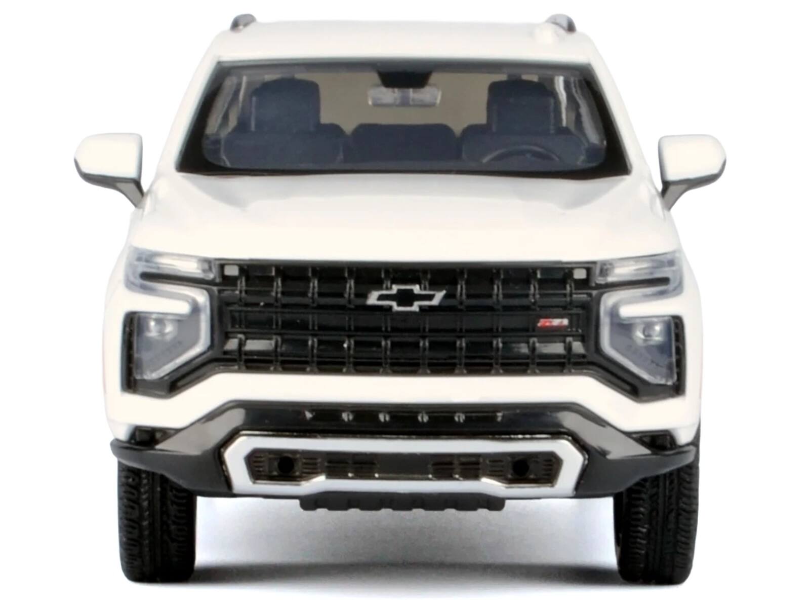 Left. Motormax - 2025 Chevrolet Tahoe Z71 White "Timeless Legends" Series 1/24 Diecast Model Car by Motormax - White.