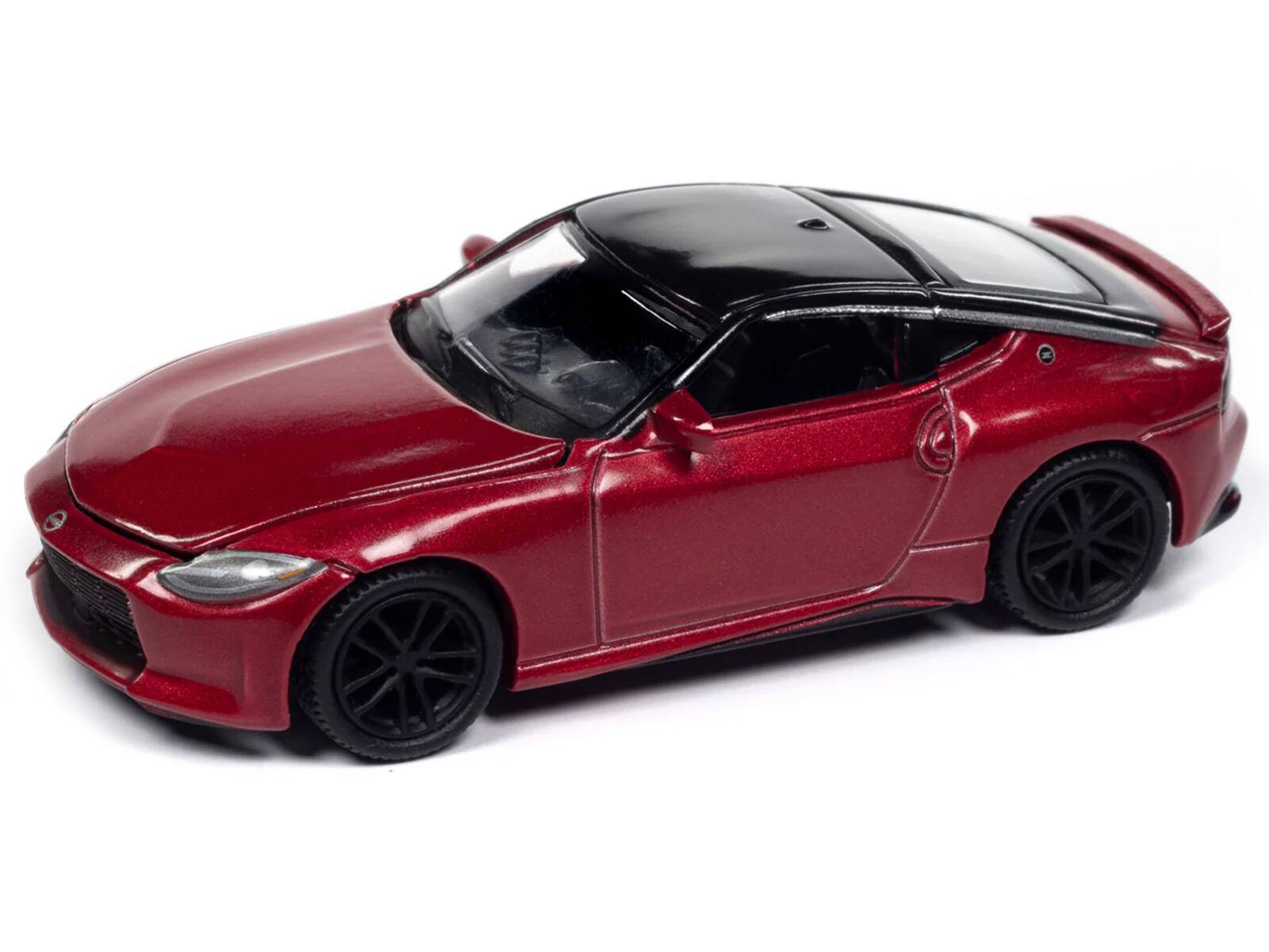 Angle. Autoworld - 2023 Nissan Z Passion Red Metallic with Black Top "Import Legends" Series 1/64 Diecast Model Car by Auto World - Red Metallic And Black.