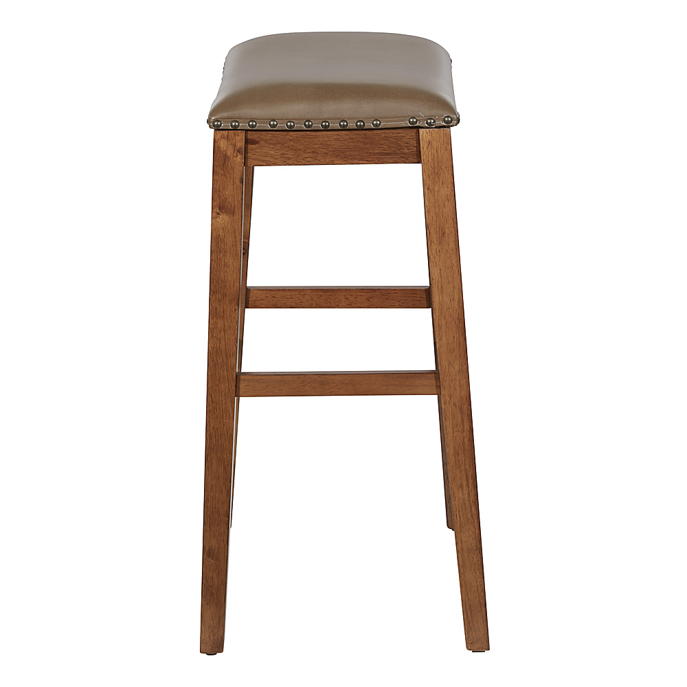 Left View: OSP Home Furnishings - Metro 29" Leather Saddle Stool with Nail Head Accents - Molasses