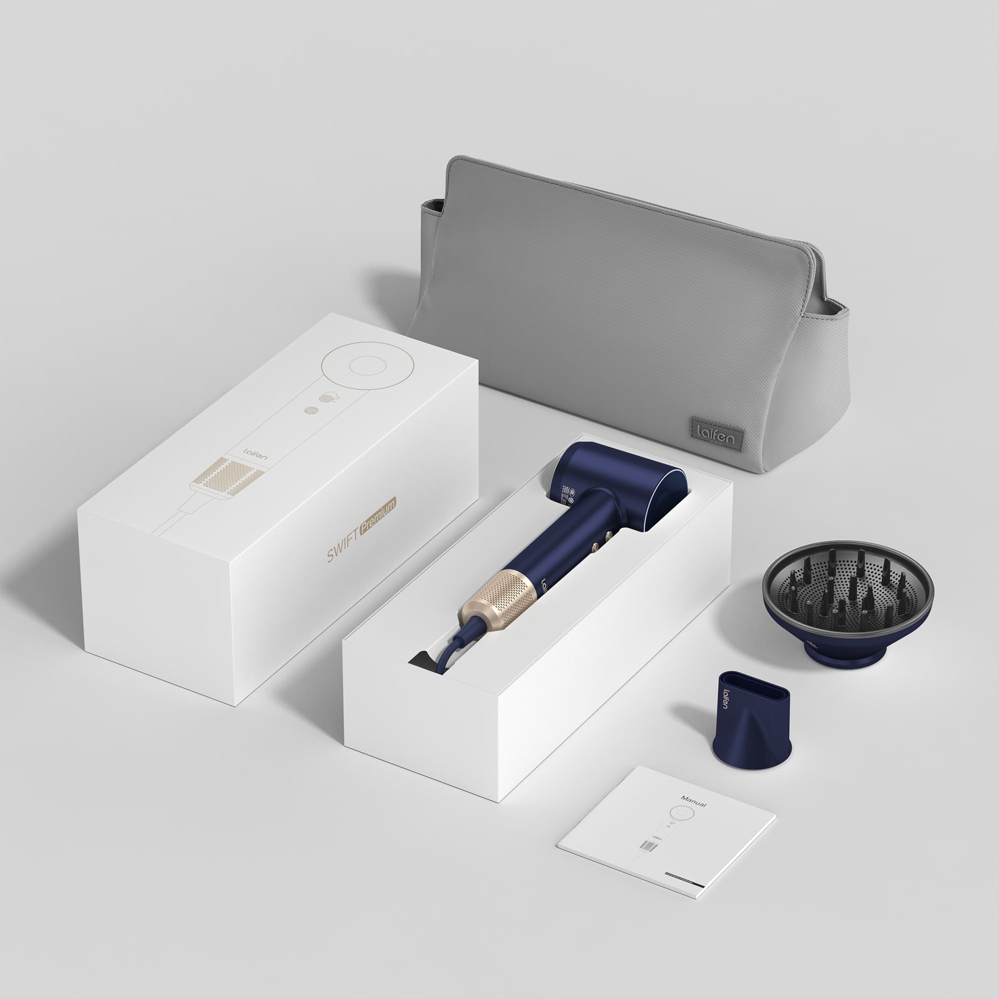 The image shows a hair dryer, a brush, and a box on a white background. The hair dryer is blue and silver, and it is placed next to the box. The brush is also placed next to the box, and it appears to be a hair brush. The box is likely the packaging for the hair dryer and brush.