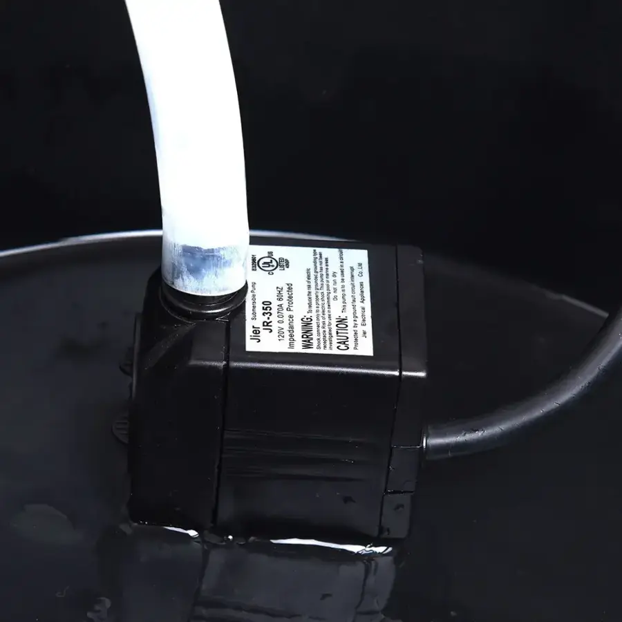 The text on the image reads:

"1.1. ombea cu 5. e - I ! 6 MF n & I R  3 I bu 3 1 Fump F 7 300 9 t 1 Appliances 60HZ Protected oe  Thispumgii Submersb JR-350 0.070A Tontuce 2 a byaground Eectrical 3 Jier 120V Impedance WARNING: I  CAUTION: Smook Protected."

The text is a mix of different languages, and it appears to be a description or instructions for the pump. It is not possible to provide a proper interpretation without more context or knowledge of the languages used.