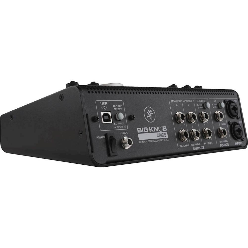 The text on the image reads:

USB REC SRC SELECT MONITOR 2-TRACK a 1-0 - 14 POWER 2-TRACK INPUTS 12 +1BVDC 5A BIG KNOB STUDIO CONTROLLER UNTERNACE MONITOR UNDAL BA UNBAL UNBAL BAL SAL OUTPUTS 10 UNBL SOURCE INPUTS