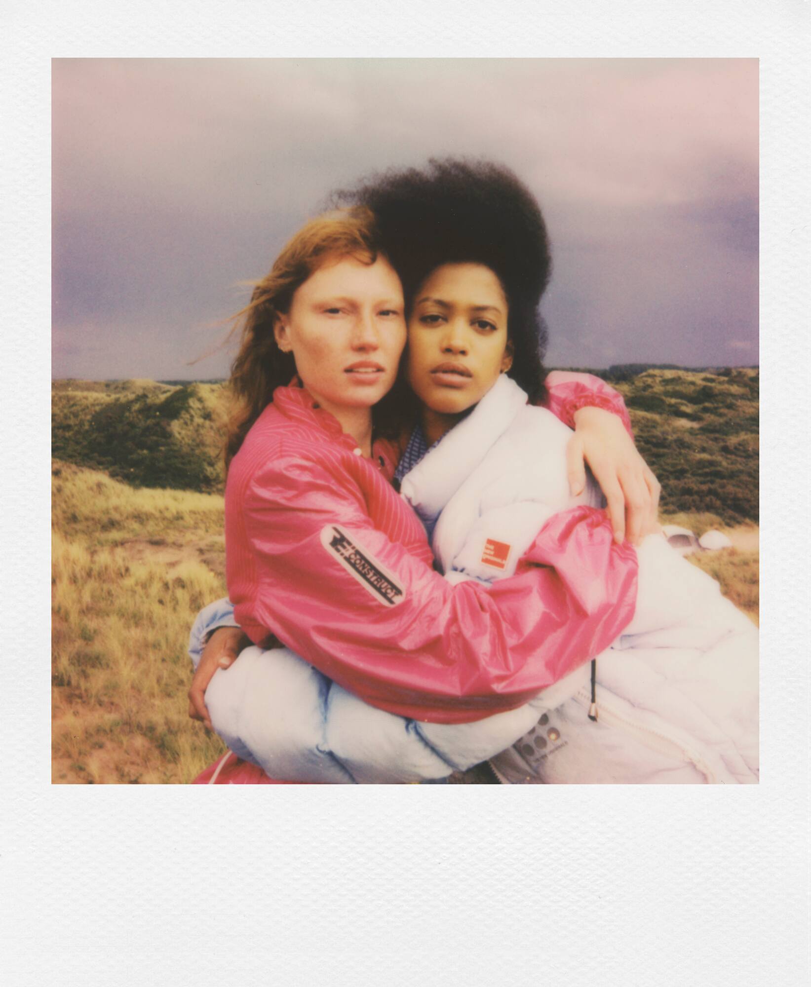 Angle. Polaroid Originals - NOW Gen 2 Camera in Vintage White with Double Pack Film and Photo Box.