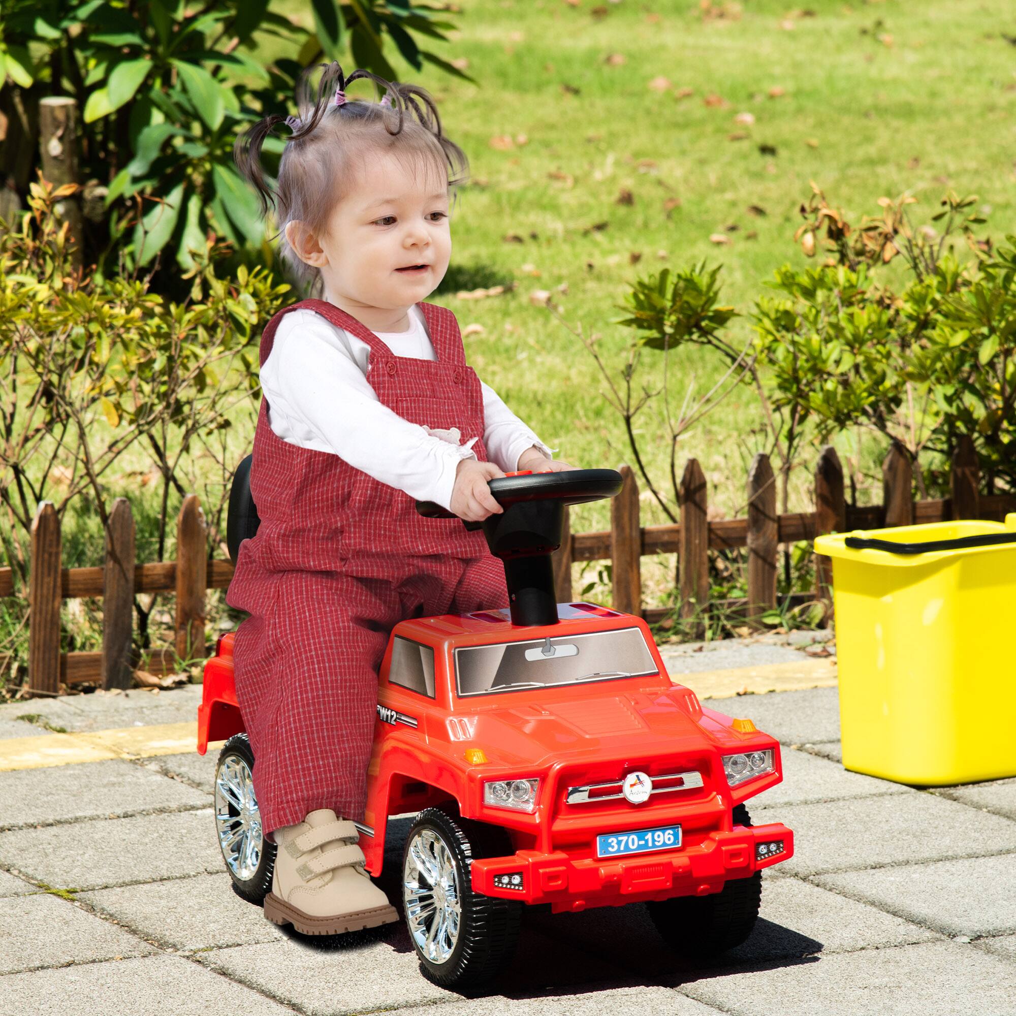 Angle. Aosom - Kids Ride on Push Car, SUV Style Sliding Walking Car, Horn, Music, Working Lights, Storage, Anti-dumping System.