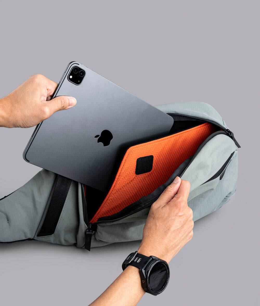 Alt View 6. ALPAKA - Crossbody Sling Bag 7.5L (Left Shoulder) for Men, Fits 11" Tablet, Phone Sleeve, Bottle Pocket, Luggage Pass-Through - Grey Axoflux 210D.