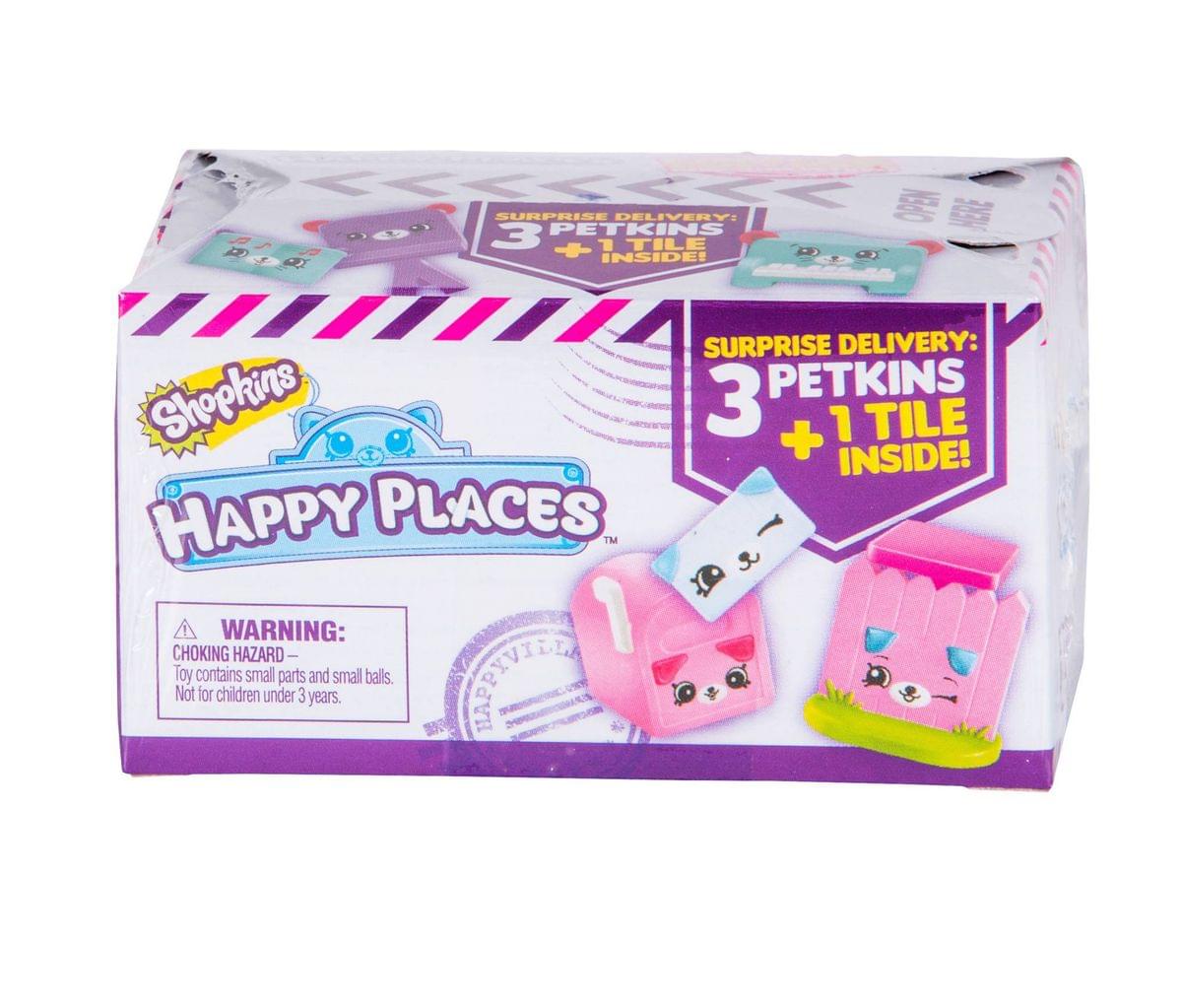Sure! Here is the corrected text:

---

**Shopkins Happy Places**

**SURPRISE DELIVERY: 3 PETKINS + 1 TILE INSIDE!**

**WARNING: CHOKING HAZARD - Toy contains small parts and small balls. Not for children under 3 years.**

---

This text is grouped and corrected from the image.