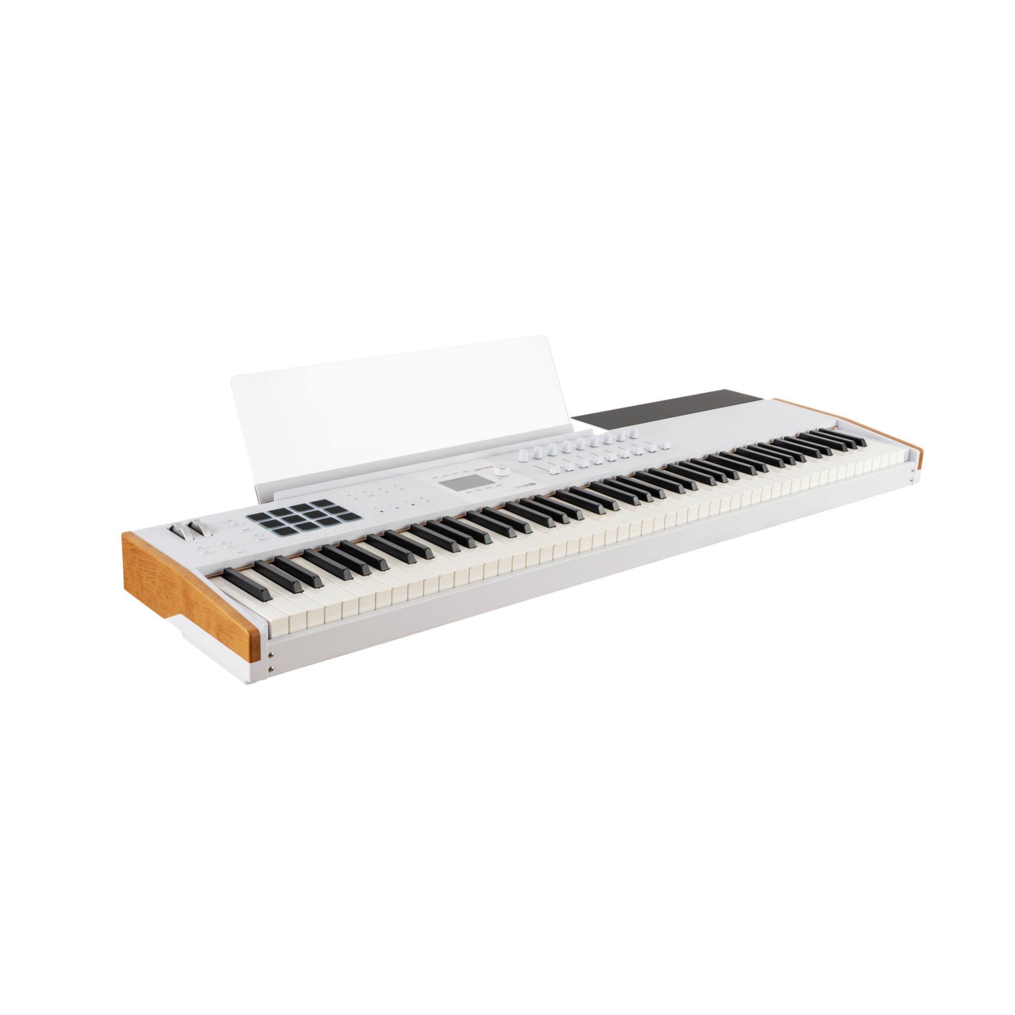 Angle. Arturia - KeyLab 88 mk3 MIDI Controller with Hammer-Action Keybed, Pads, Faders, Encoders, and DAW Integration - White.