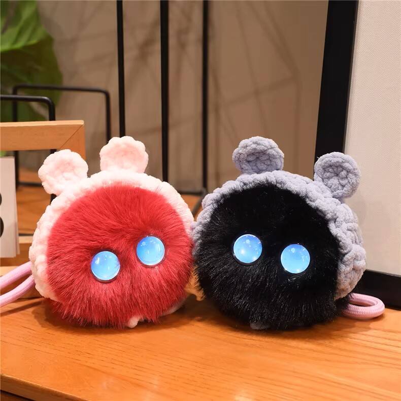 Left. Siljoy - AI Emotional Companion Smart Robot Plush Toy, Trendy Educational Toy for Children.