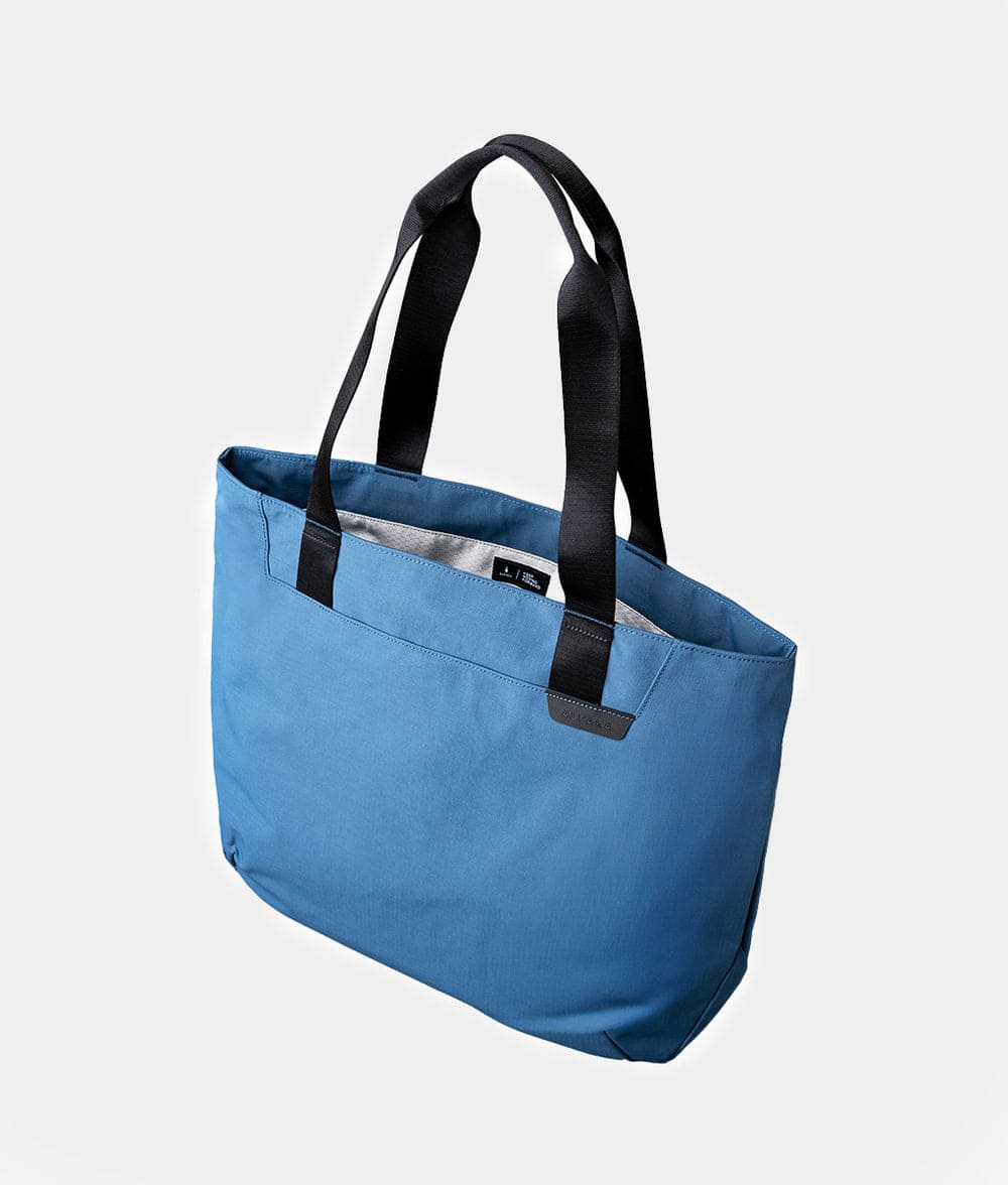 Front. ALPAKA - Laptop Tote Bag for Work & Travel,20L, Built-in Padded Sleeve for 16" Laptop, Magnetic Open-Top (No Zipper) - Blue Axoflux 210D.