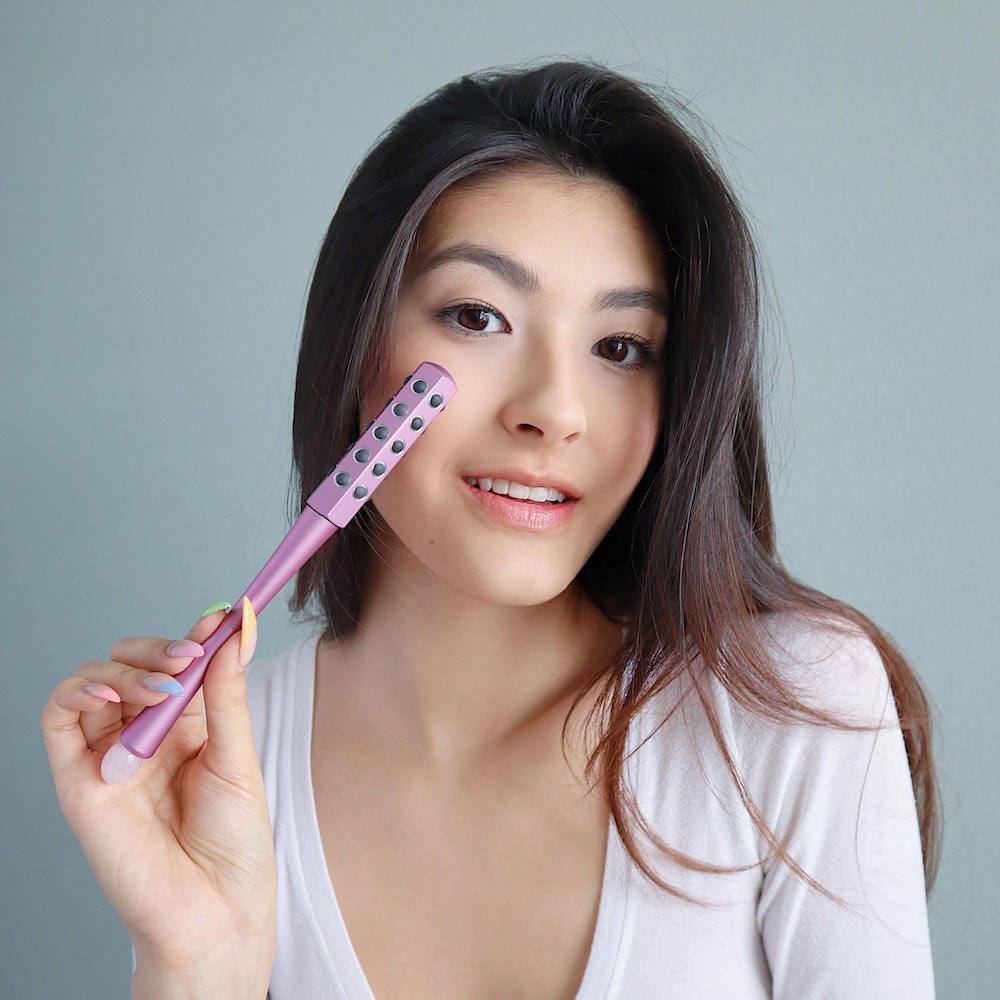Left. fancii - Remi Uplift Facial Massage Roller - Purple.