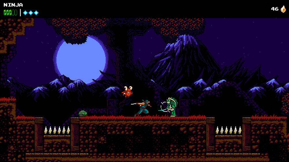 The image shows a video game with a character in a dark environment, possibly a cave, holding a sword. The character is standing on a ledge, and there is a moon visible in the background. The game appears to be a ninja-themed action game, as suggested by the "NINJA" text in the top left corner.