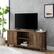 Alt View 13. Walker Edison - Modern Farmhouse TV Stand for Most TVs Up to 64" - Rustic Oak.