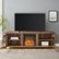 Alt View Zoom 12. Walker Edison - 70" Traditional Glass Door Cabinet Fireplace TV Stand for Most TVs up to 80" - Rustic Oak.