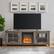 Alt View 11. Walker Edison - 70" Traditional Glass Door Cabinet Fireplace TV Stand for Most TVs up to 80" - Grey Wash.
