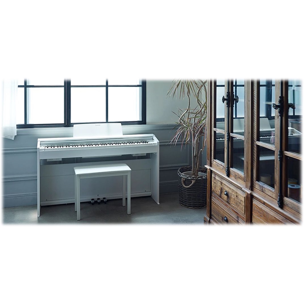 Left View: Yamaha DGX670WH Portable Digital Piano in White