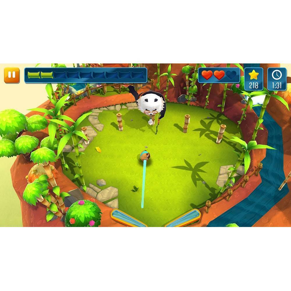 The image shows a game with a character holding a bowling ball, preparing to throw it. The game is set in a jungle environment, with a green field and palm trees surrounding the character. The character is positioned near the center of the scene, and the bowling ball is located slightly to the left of the character. The game appears to be a mix of bowling and golf, as the character is aiming to hit the ball into a hole.