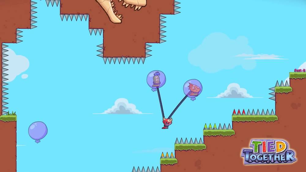 The image features a video game character, possibly a dinosaur, standing on a platform while holding onto a rope. The character is surrounded by several balloons, which are floating in the air. The scene takes place in a cave-like environment, with the character and balloons being the main focus of the image. The text "MR a TIED TOGETHER" is not related to the image and does not provide any context or information about the scene.