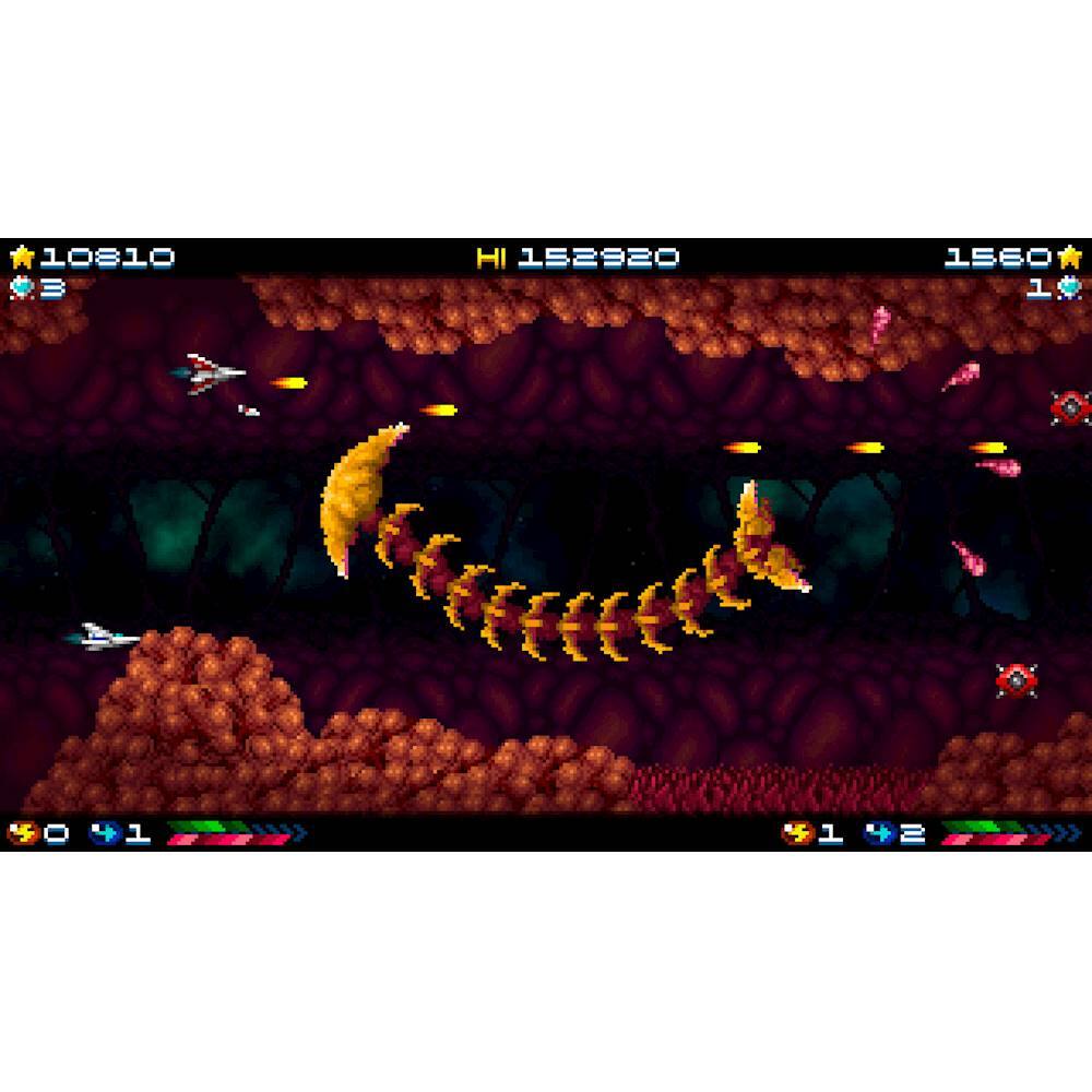 The image shows a video game with a large dragon-like creature in the center, surrounded by other creatures. The game appears to be set in a dark cave, with the dragon-like creature being the main focus of the scene. The game is likely a space shooter, as there are multiple spaceships visible in the image. The largest text in the image is "1560," which could be a reference to the game's score or a specific level.