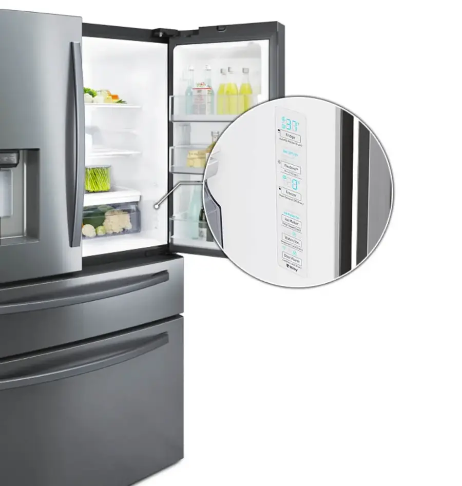 The image features a large refrigerator with its door open, revealing a variety of food items inside. The refrigerator is filled with bottles, including water and juice, as well as broccoli and carrots. The refrigerator is also equipped with a digital display, which provides information about the temperature and humidity inside. The refrigerator is a part of a larger kitchen setup, which includes a sink and an oven.