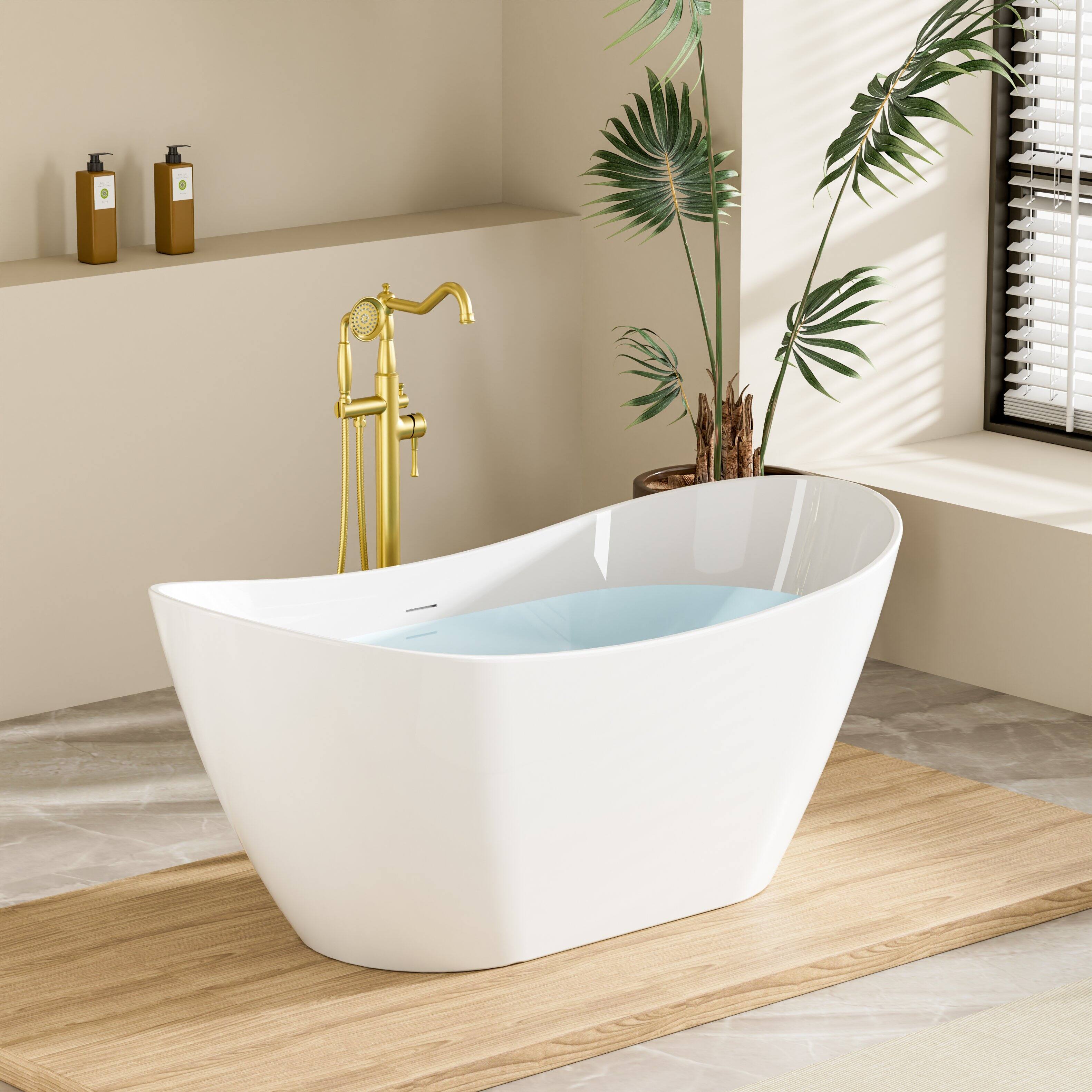 Angle. WELLFOR - Vela 60 in. x 29 in. Acrylic Oval Freestanding Soaking Bathtub with Center Drain and Overflow - White.