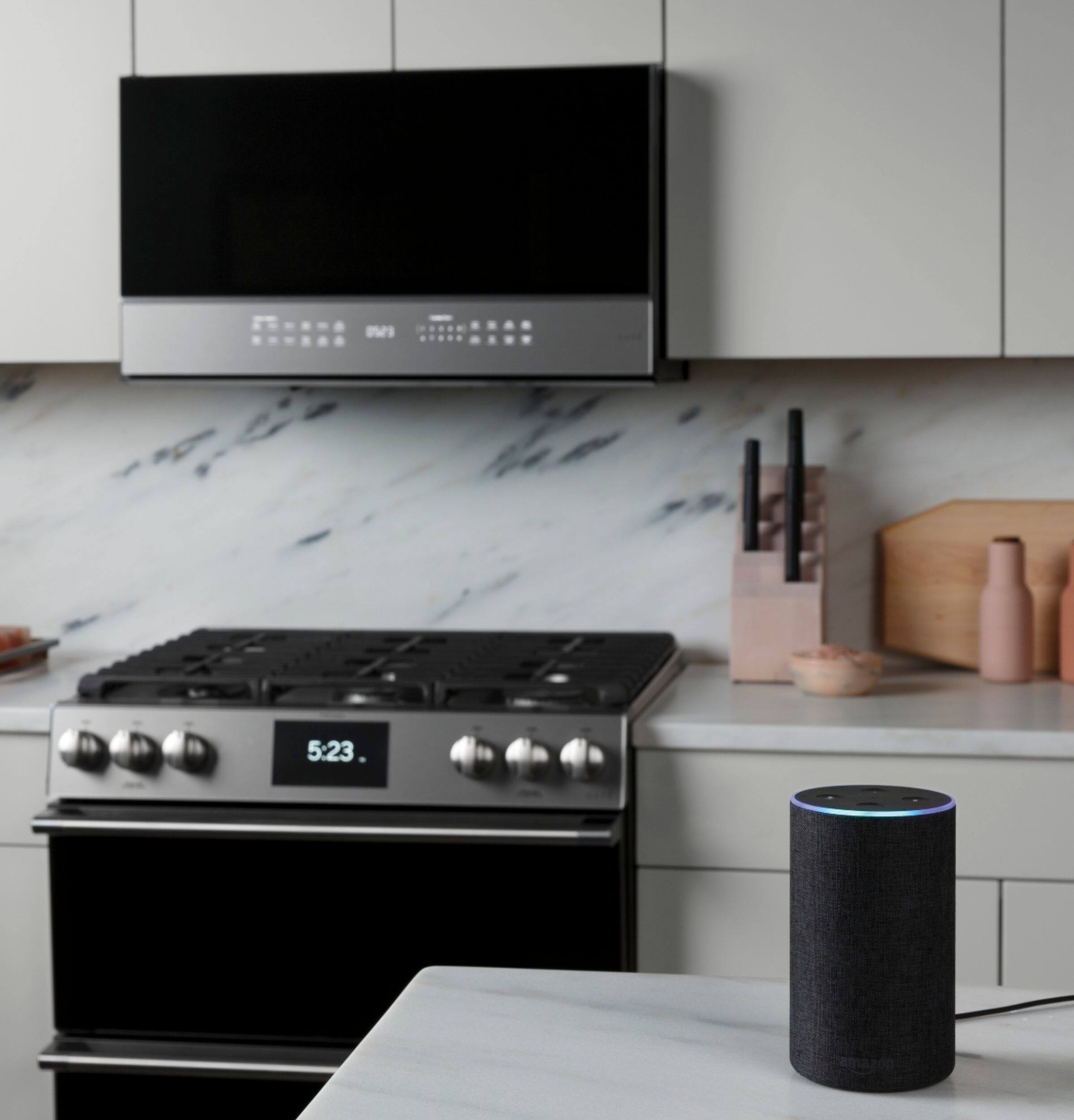 Alt View 18. Café - 2.1 Cu. Ft. Over-the-Range Microwave with Sensor Cooking - Platinum Glass.