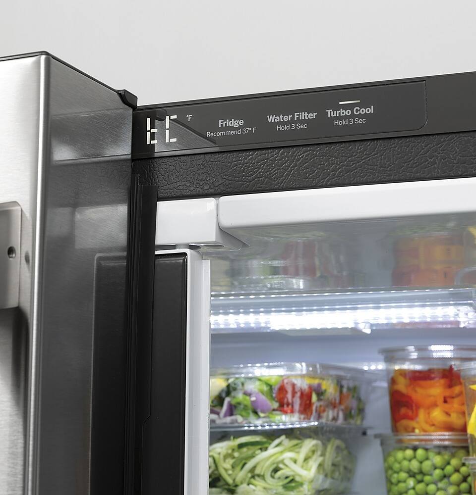 The image shows a refrigerator with its door open, revealing a variety of food items inside. The refrigerator has a water filter, which is recommended to be used for better taste and purity. The refrigerator is designed to hold 37°F for optimal food preservation.