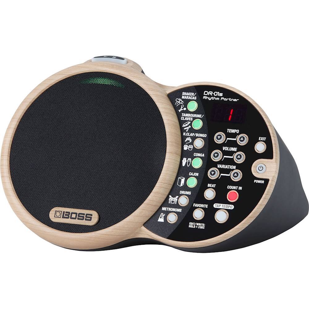 The image features a Boss drum machine, which is a versatile and compact musical instrument. It has a variety of settings, including a metronome, a drum machine, and a rhythm partner. The device also has a built-in speaker and a headphone jack for private practice. The Boss drum machine is designed to help musicians practice and improve their drumming skills, as well as provide a fun and engaging way to play music.