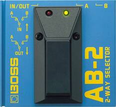 The text on the image is already grouped and correctly written. It reads: "IN/OUT A B A B IN A B OUT DBOSS AB-2 SELECTOR 2-WAY."