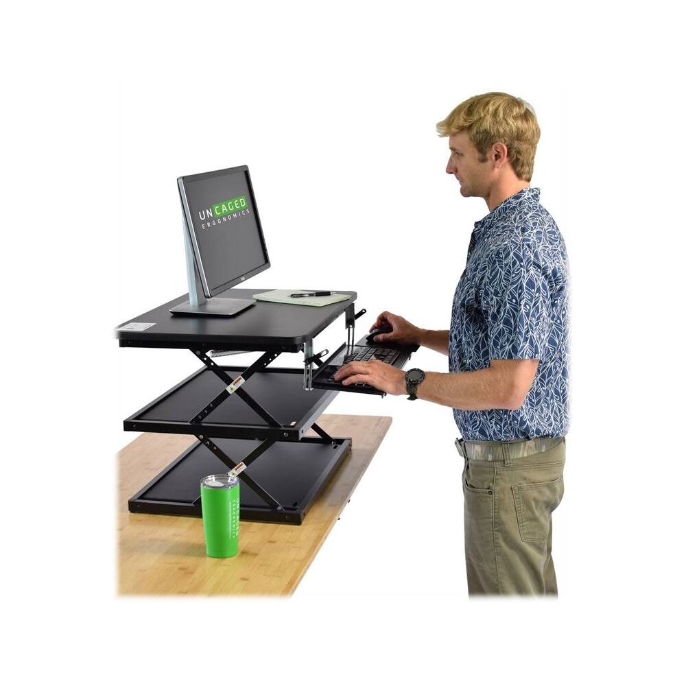 Left. Uncaged Ergonomics - CHANGEdesk Laminate Standing Desk Converter With Adjustable Height - Black.