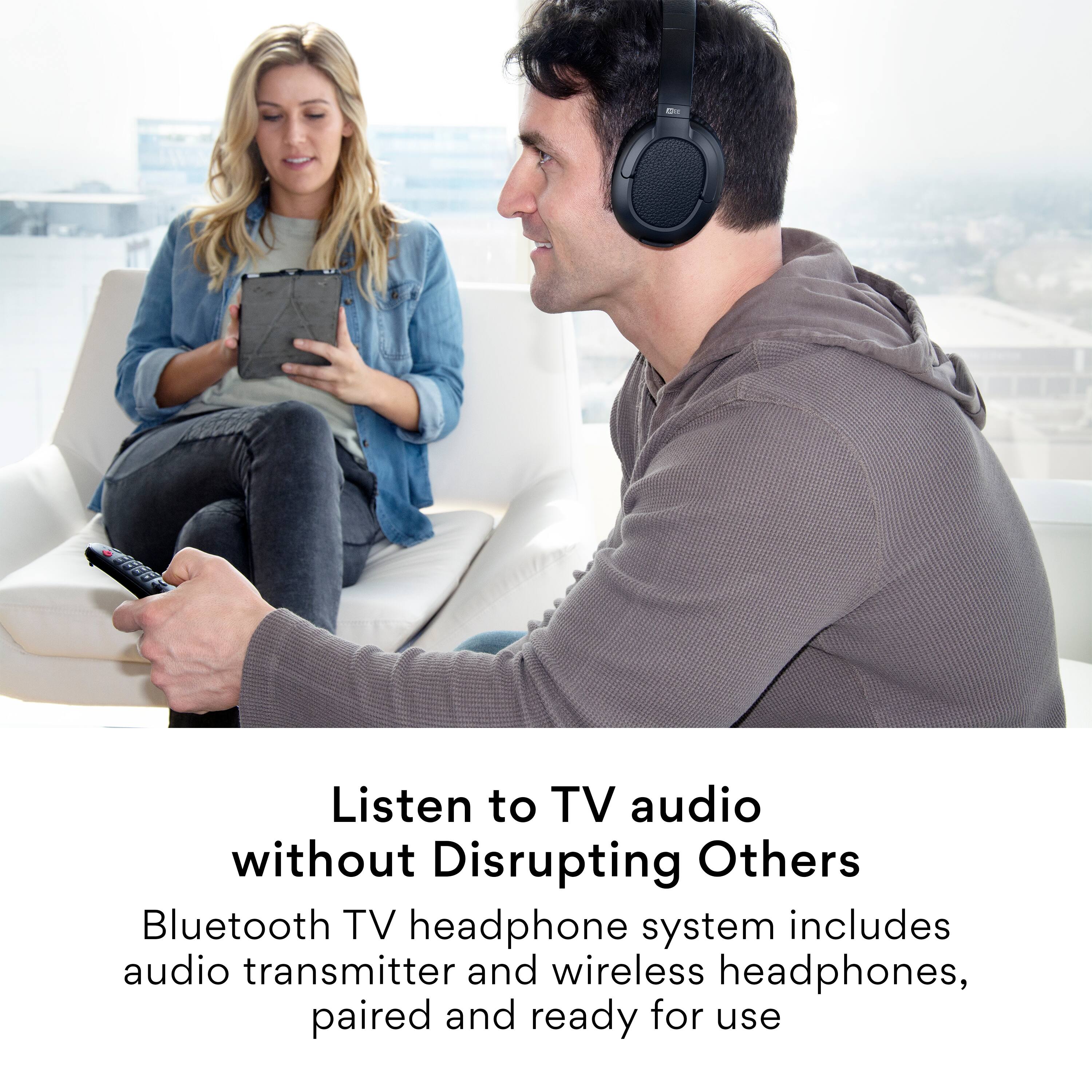 Listen to TV audio without disrupting others. Bluetooth TV headphone system includes audio transmitter and wireless headphones, paired and ready for use.