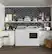Alt View 21. GE - 7.4 Cu. Ft. 13-Cycle Gas Dryer with Steam - White on White/Silver Backsplash.