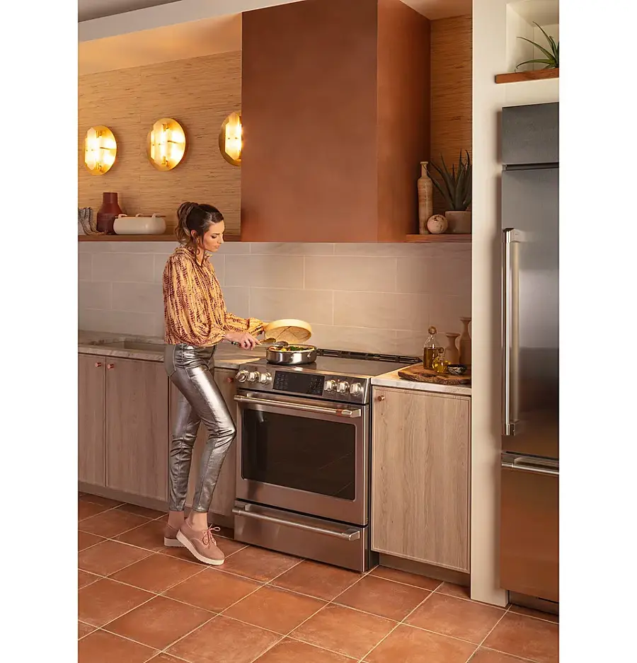 Alt View 19. Café - 5.7 Cu. Ft. Slide-In Electric Induction True Convection Range with Steam Cleaning and In-Oven Camera, Customizable - Stainless Steel.