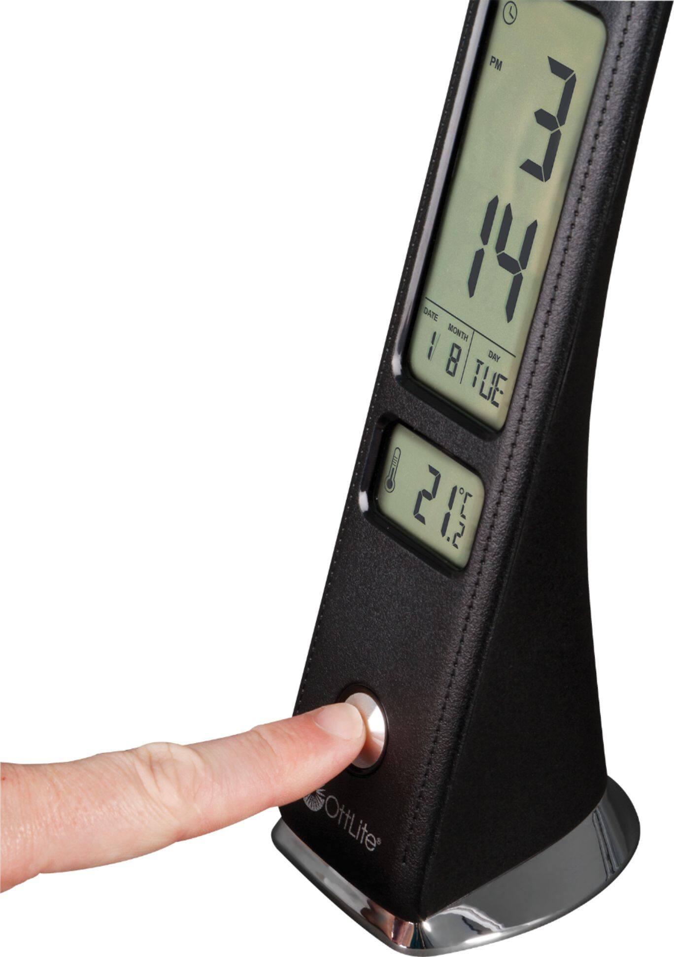 The text on the image reads: "PM 3 DATE 14 MONTH LL 8 DAY VBITUE TUE 8 3 7 L 5. OttLite." This text is not grouped correctly, so I will regroup and correct it for you:

"PM 3 DATE 14 MONTH LL 8 DAY VBITUE TUE 8 3 7 L 5. OttLite."

Corrected text: "PM 3 DATE 14 MONTH LL 8 DAY VBITUE TUE 8 3 7 L 5. OttLite."