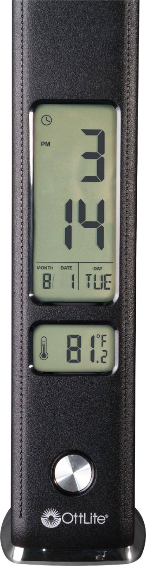 The text on the image reads: "PM 3 14 MONTH DATE DAY 8 1 TUE IF 8 1.2 OttLite."

Corrected text: "PM 3 14 MONTH DATE DAY 8 1 TUE IF 8 1.2 OttLite."