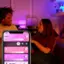 Left. Philips - Hue Go Bluetooth Table Lamp - White and Color Ambiance.
