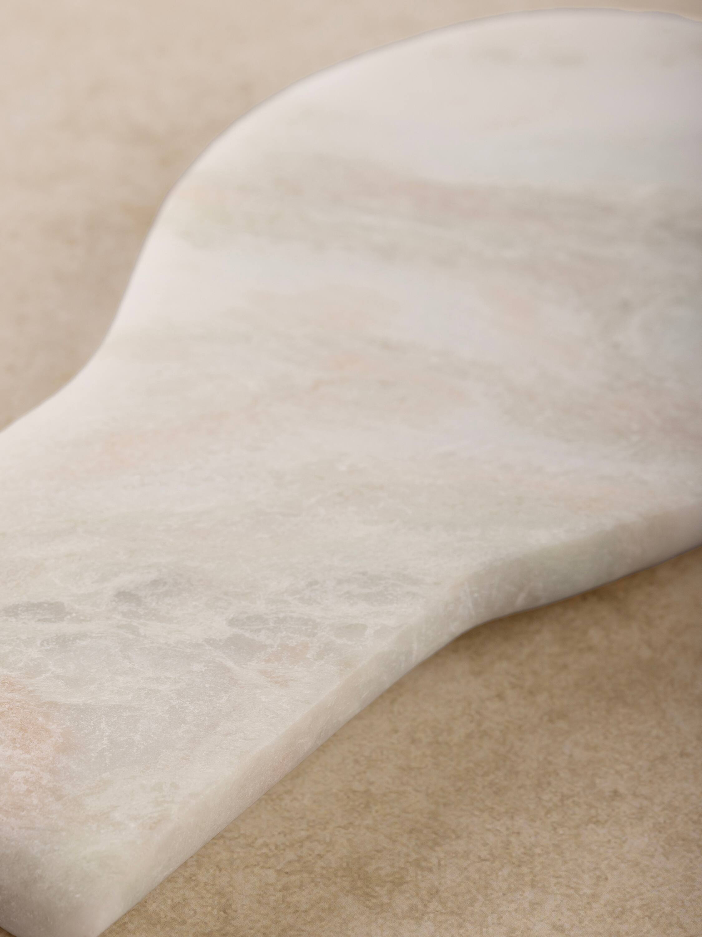 Left. GAURI KOHLI - Machu Picchu Spoon Rest - Shades of white with streaks of color.