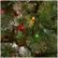 Alt View 12. Noble House - 7' Mixed Spruce Pre-Lit Hinged Artificial Christmas Tree with Glitter Branches, Red Berries and Pinecones - Green + Multi Lights.