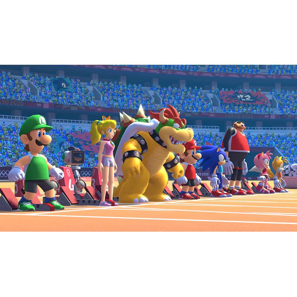 The image features a group of cartoon characters, including Mario and Luigi, standing on a track. They are lined up and appear to be participating in a race or event. There are a total of nine characters visible in the image, with some standing closer to the front and others further back. The setting seems to be a stadium, as there are chairs and benches scattered around the area. The characters are all facing the same direction, suggesting that they are all focused on the same goal or event.