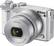 Left. Nikon - 1 J5 Mirrorless Camera with NIKKOR 10-30mm f/3.5-5.6 PD Zoom Lens - White.