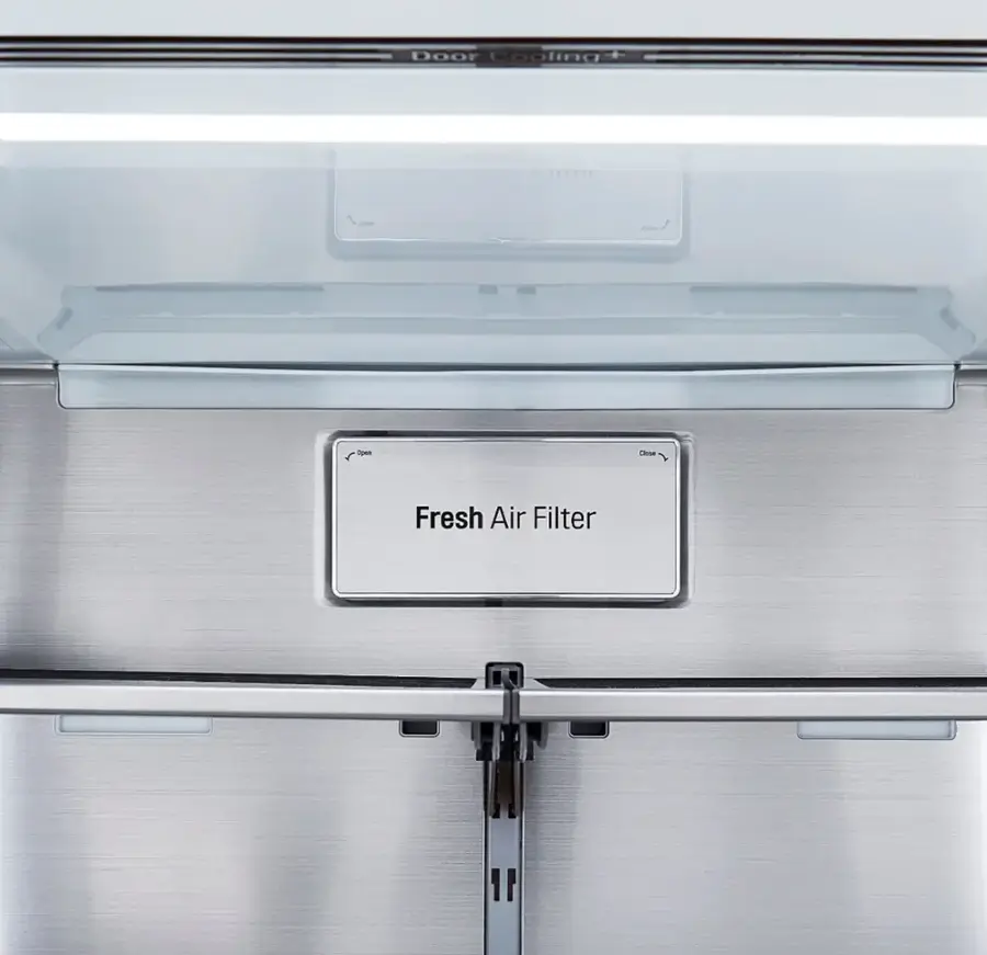 The image features a large refrigerator with a PrintProof finish. The refrigerator has a double door design and a bottom drawer freezer. The PrintProof finish is designed to protect the surface from fingerprints and smudges, ensuring a clean and polished appearance. The refrigerator is likely a part of a full-size refrigerator set, offering ample storage space and convenience for users.